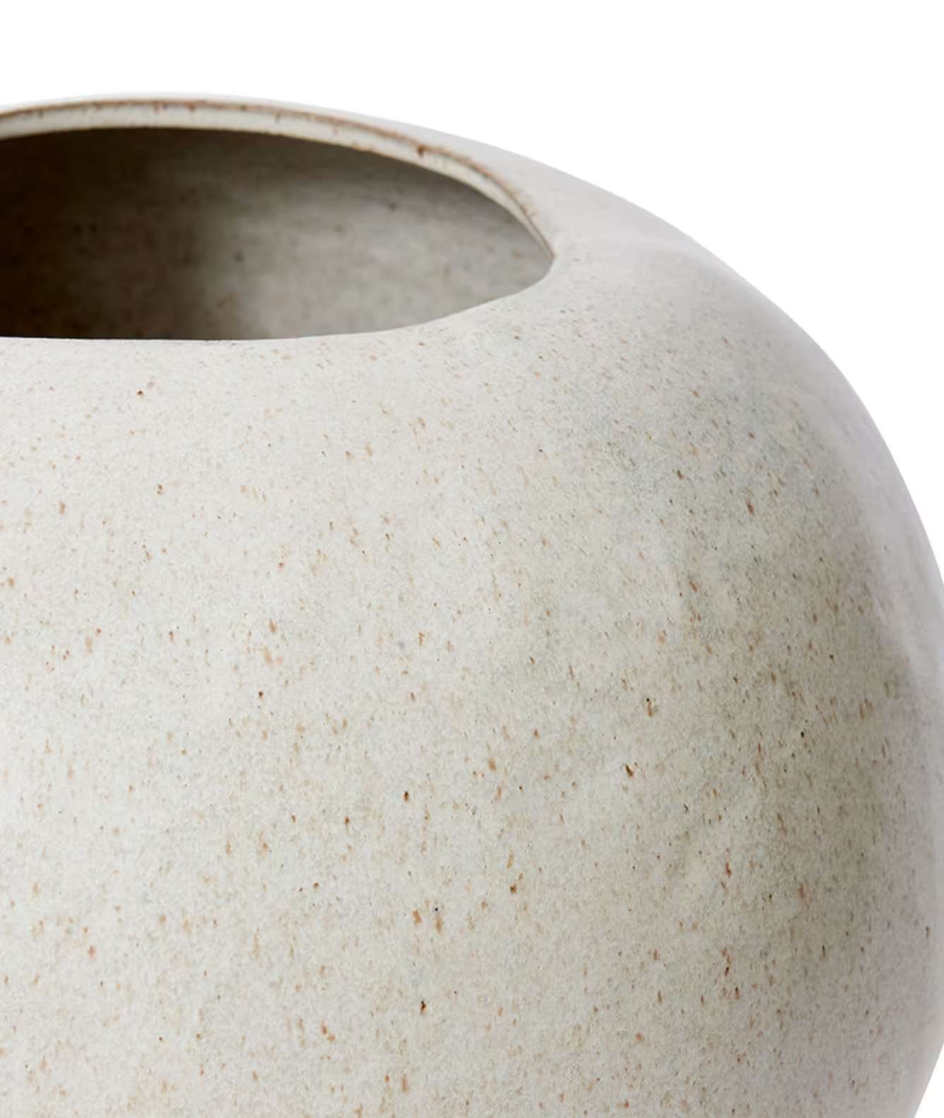 Close-up of a textured ceramic pot on a white background