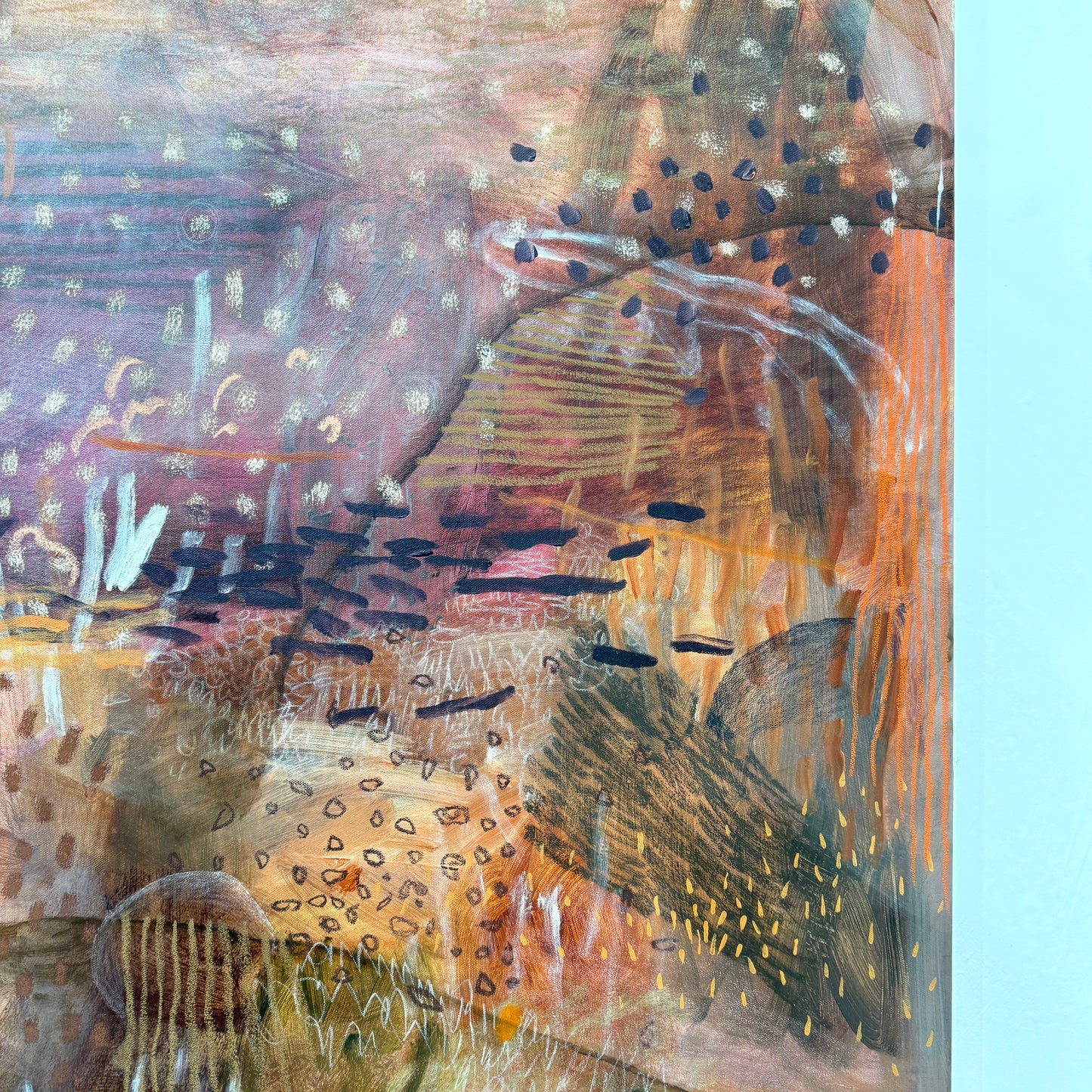 JWG Abstract art with textured brush strokes in brown, orange, and purple on a light blue background