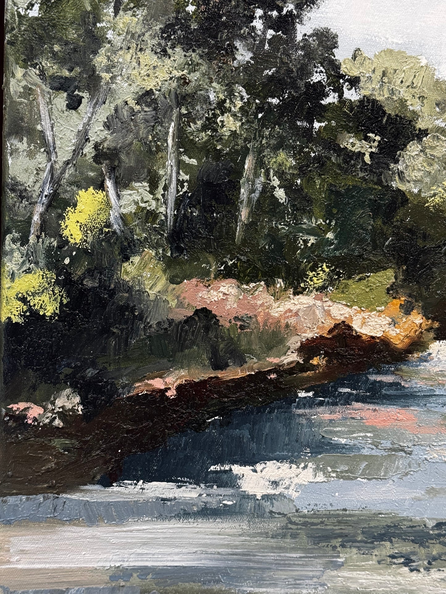 Painting of a forest scene with a fallen log and trees.