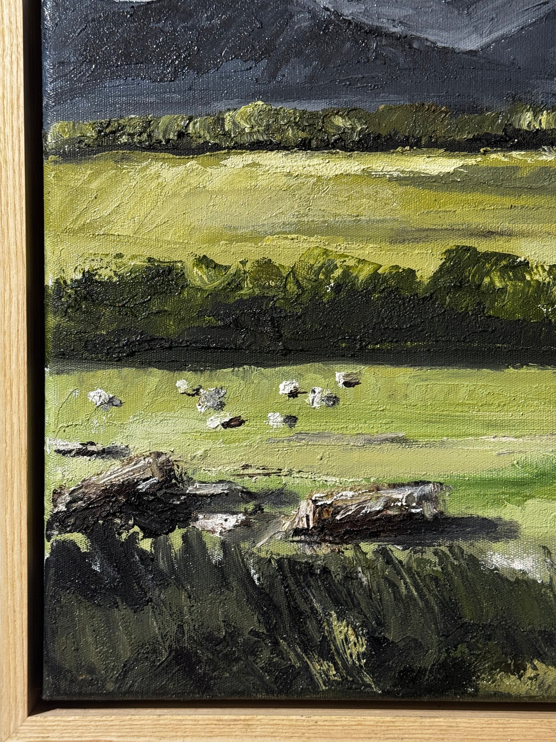 Painting of a landscape with green fields, trees, and a dark sky.