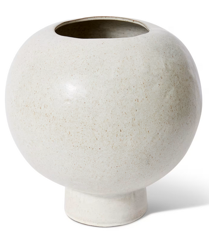 White ceramic vase on a white background